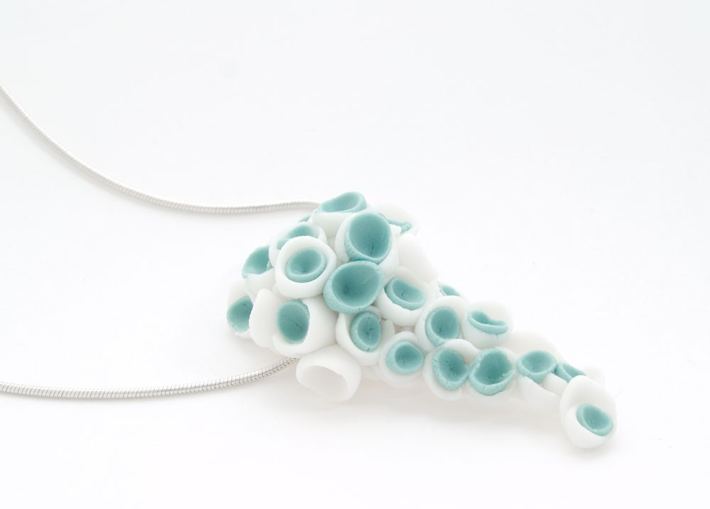 Lanikai Porcelain Pendant With White And Turquoise Flower Decoration.